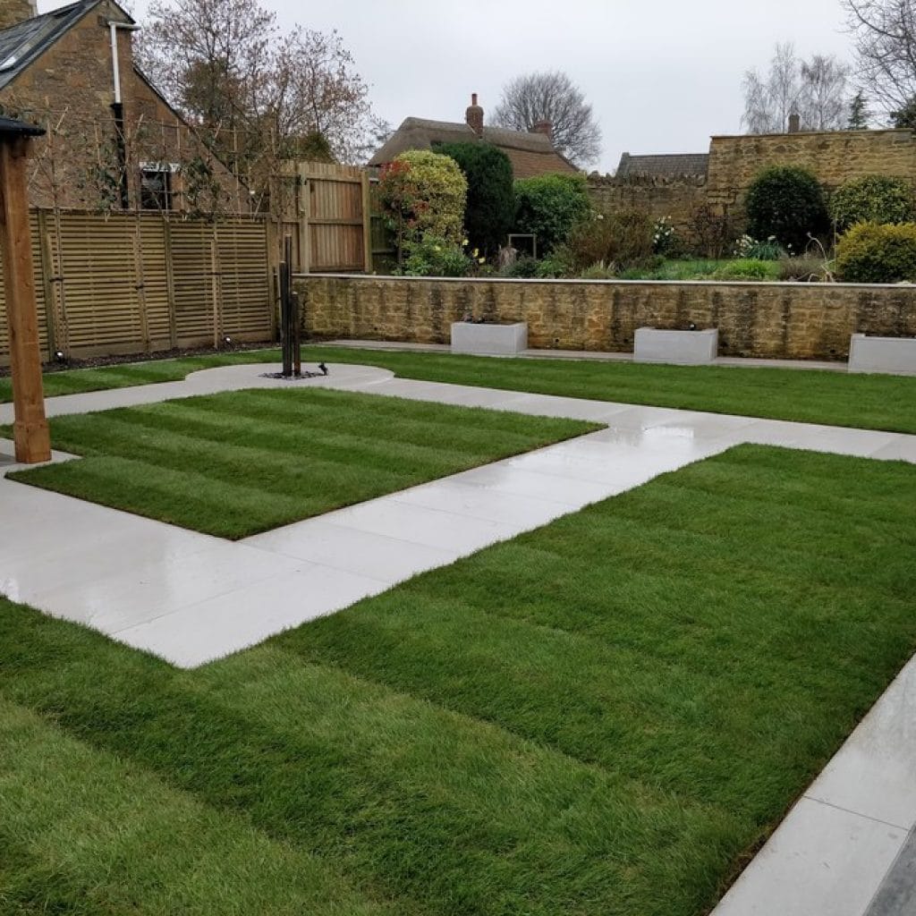 natural lawn with porcelain paved paths