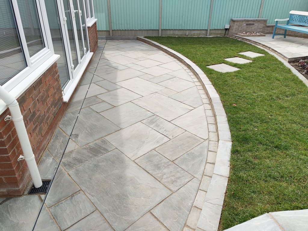 small curved patio in natural limestone