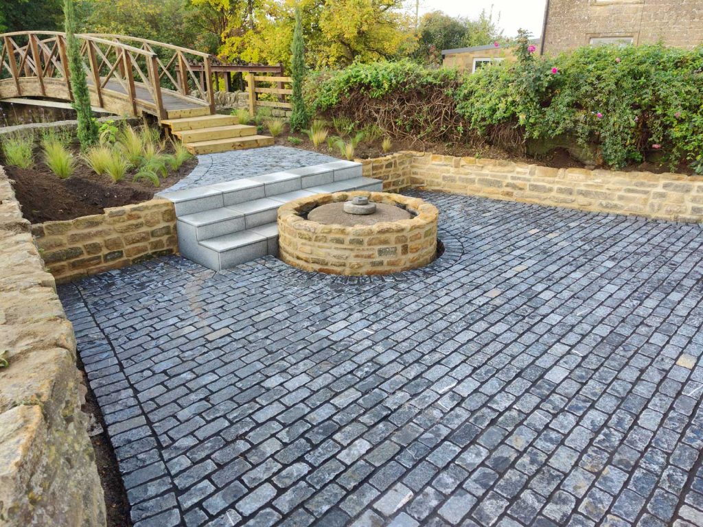 terraced garden wih rustic bridge